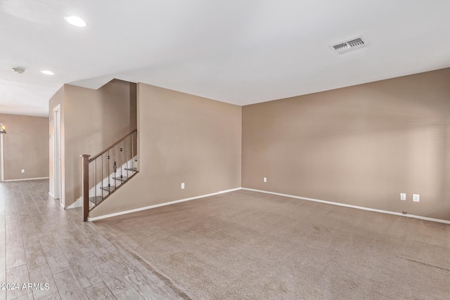 unfurnished room featuring light hardwood / wood-style floors