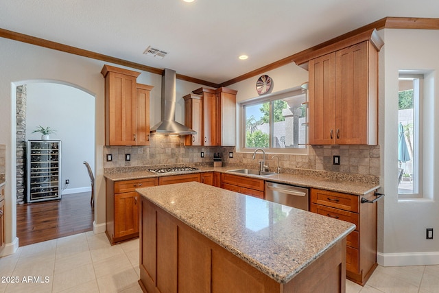 20809 N 17th St, Phoenix, AZ 85024 - kitchen featuring wall chimney exhaust hood, appliances with stainless steel finishes, beverage cooler, crown molding, and tasteful backsplash