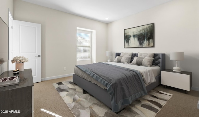 carpeted bedroom with baseboards