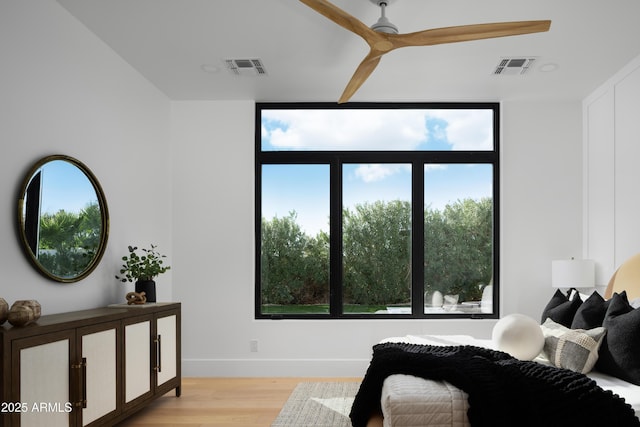 4120 N 44th Pl, Phoenix, AZ 85018 - bedroom with light wood-style floors, baseboards, and ceiling fan