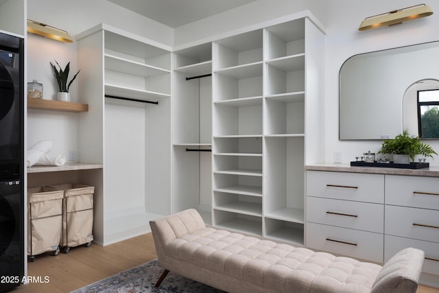 4120 N 44th Pl, Phoenix, AZ 85018 - walk in closet featuring wood finished floors and a barn door