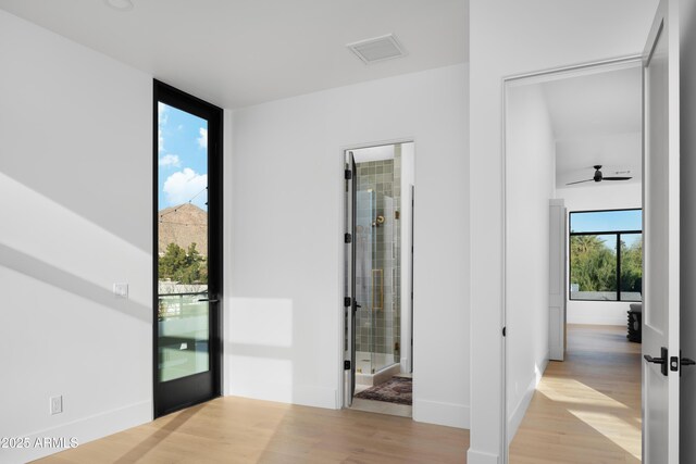 4120 N 44th Pl, Phoenix, AZ 85018 - bedroom with light wood-style flooring and baseboards