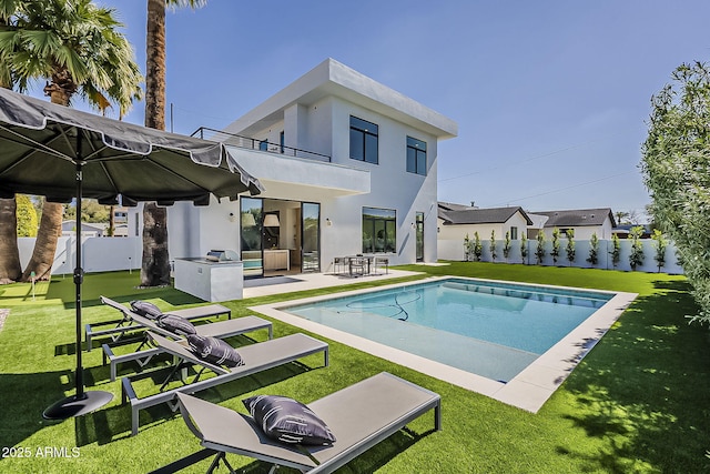 4120 N 44th Pl, Phoenix, AZ 85018 - back of house with a balcony, stucco siding, a patio area, and an outdoor living space