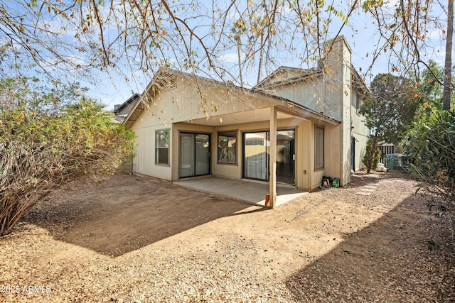 rear view of property with a patio