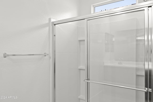 bathroom with an enclosed shower