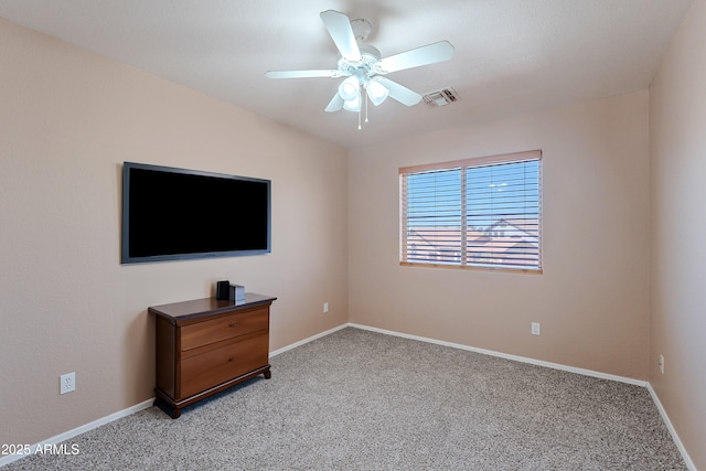 20277 N 68th Dr, Glendale, AZ 85308 - unfurnished bedroom with light colored carpet and ceiling fan