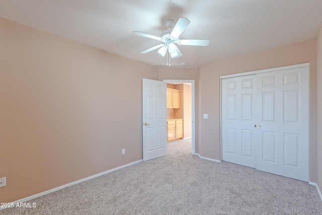 20277 N 68th Dr, Glendale, AZ 85308 - unfurnished bedroom featuring carpet, a closet, and a ceiling fan