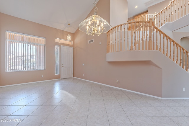 20277 N 68th Dr, Glendale, AZ 85308 - tiled foyer entrance with high vaulted ceiling, stairway, and a chandelier