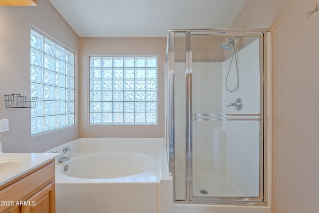 20277 N 68th Dr, Glendale, AZ 85308 - full bathroom featuring plenty of natural light, a stall shower, vanity, and a garden tub
