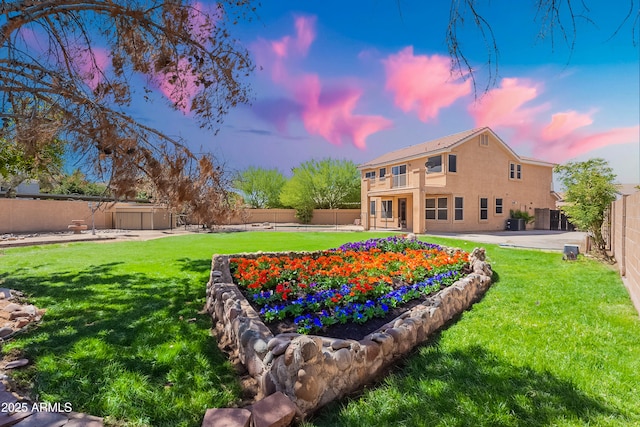 20277 N 68th Dr, Glendale, AZ 85308 - back of house at dusk featuring a fenced backyard, stucco siding, and a patio