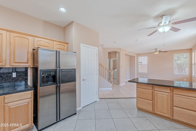 20277 N 68th Dr, Glendale, AZ 85308 - kitchen featuring stainless steel fridge, light brown cabinetry, arched walkways, ceiling fan, and backsplash