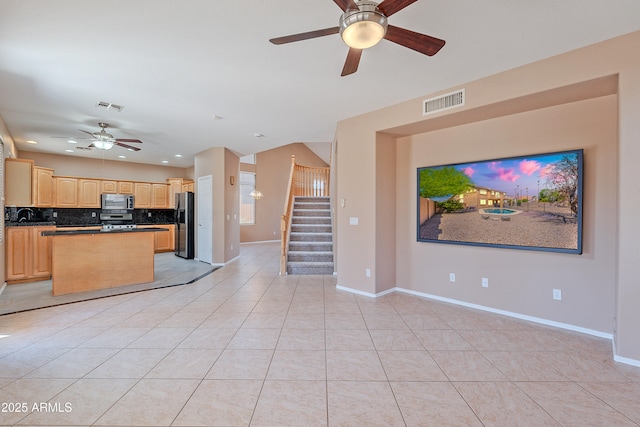 20277 N 68th Dr, Glendale, AZ 85308 - unfurnished living room with ceiling fan, stairway, light tile patterned floors, and recessed lighting