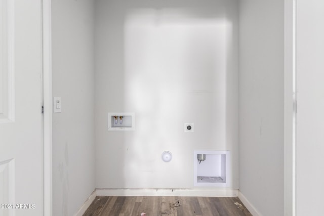 laundry room with hookup for a gas dryer, hookup for a washing machine, wood-type flooring, and hookup for an electric dryer