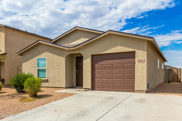 view of front of property featuring a garage