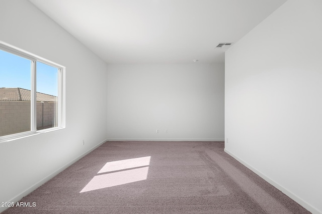 680 W Crowned Dove Trl, Casa Grande, AZ 85122 - carpeted empty room with visible vents and baseboards