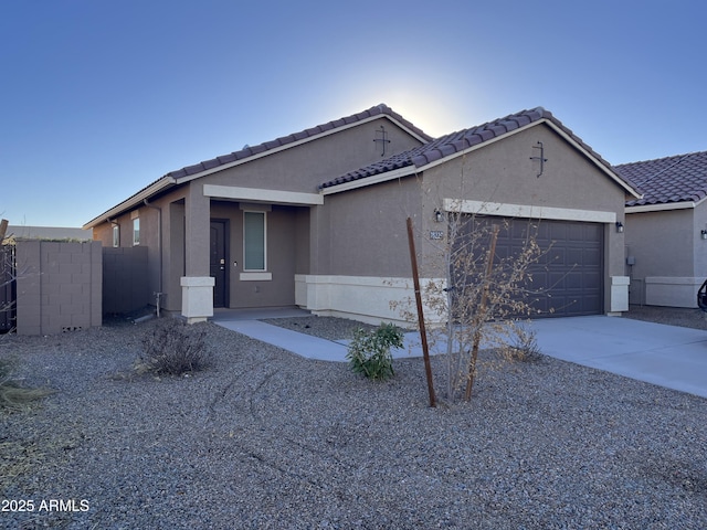 view of front of property with a garage