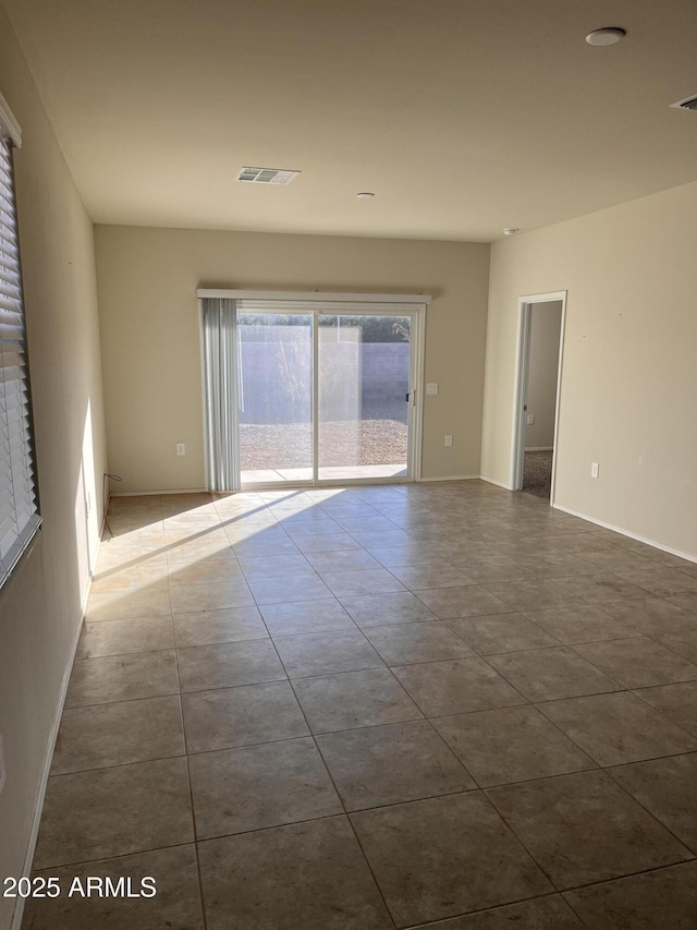 view of tiled empty room