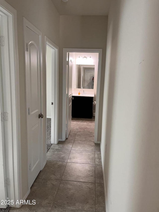 corridor featuring tile patterned flooring