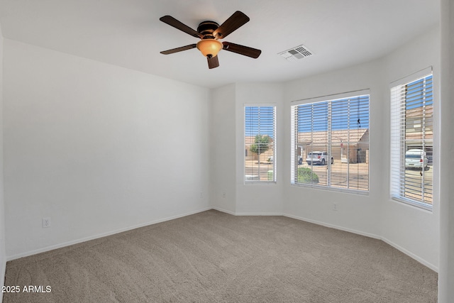 1669 E Santa Fiore St, San Tan Valley, AZ 85140 - carpeted empty room with a ceiling fan and baseboards