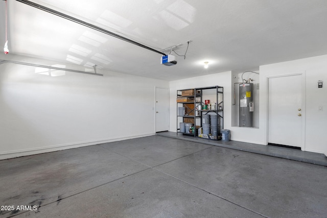 1669 E Santa Fiore St, San Tan Valley, AZ 85140 - garage featuring water heater, a garage door opener, and baseboards
