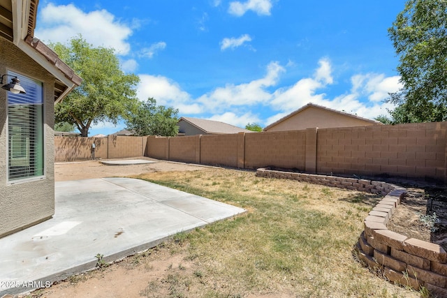 1669 E Santa Fiore St, San Tan Valley, AZ 85140 - view of yard featuring a patio area