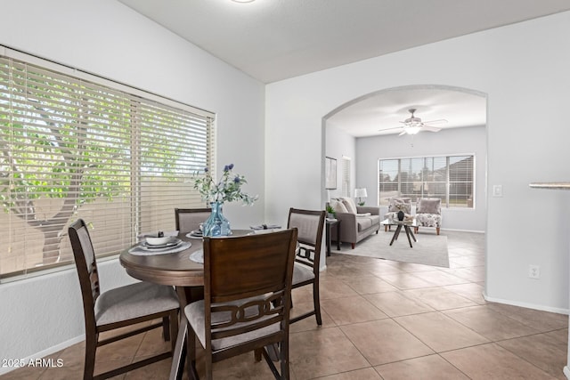 dining room featuring ceiling fan and light tile patterned floors