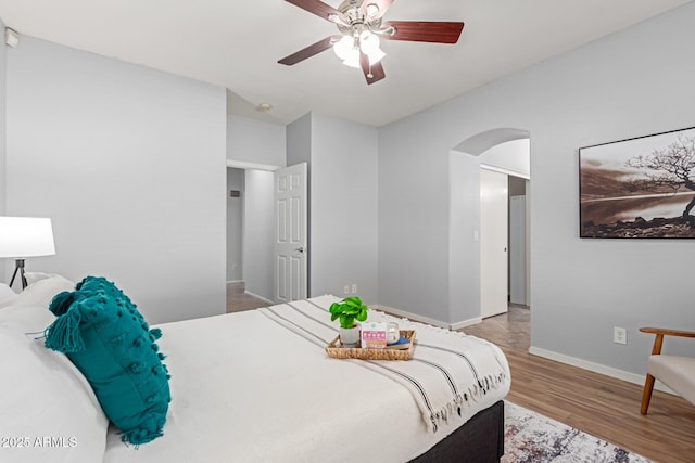 bedroom featuring ceiling fan and wood-type flooring