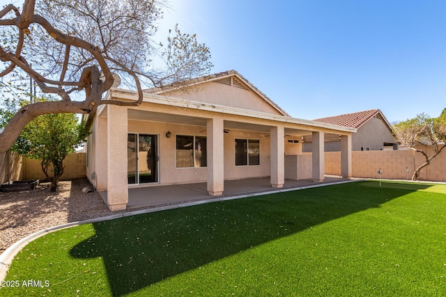 back of property featuring a patio