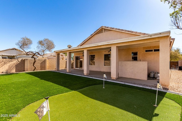 back of house with a patio area