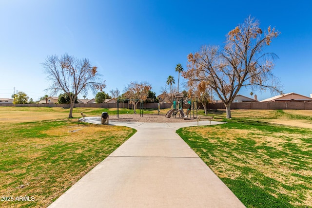 view of playground featuring a lawn