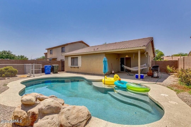 view of pool with a patio area