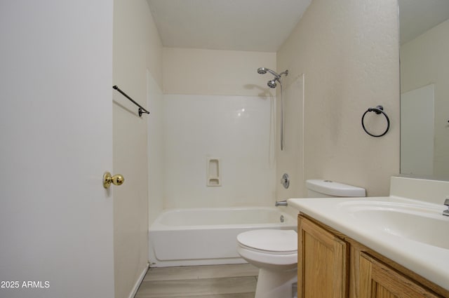 full bathroom with toilet, vanity, shower / tub combination, and hardwood / wood-style flooring