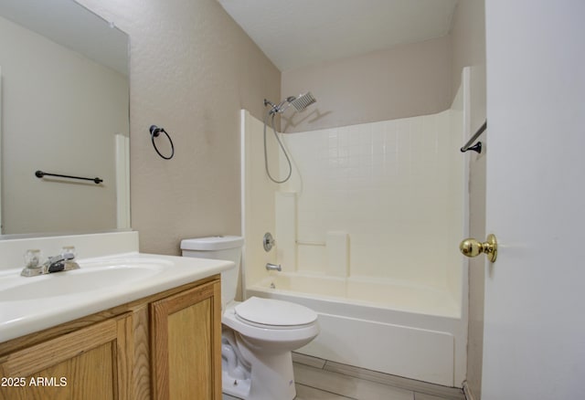 full bathroom featuring toilet, shower / bath combination, tile patterned floors, and vanity