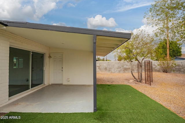 view of yard featuring a patio area and fence