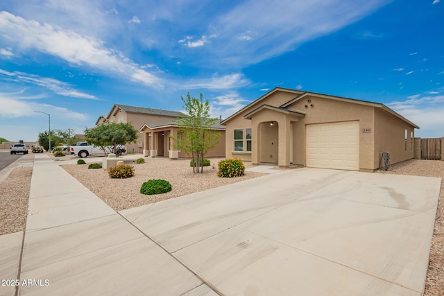 240 W Taylor Ave, Coolidge, AZ 85128 - ranch-style house with stucco siding, an attached garage, and driveway