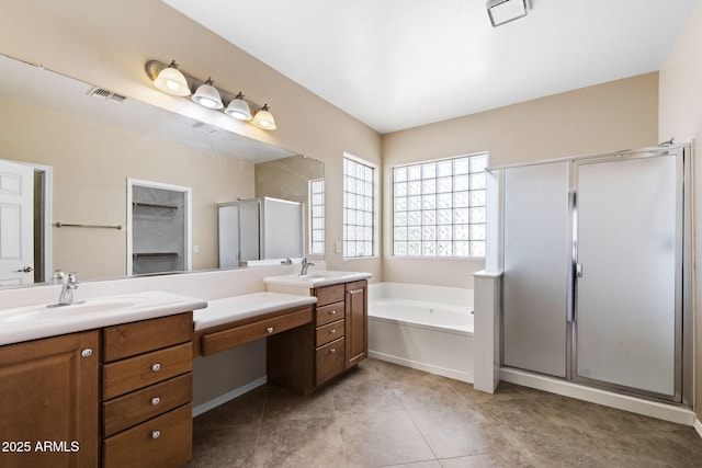 2036 E Carob Dr, Chandler, AZ 85286 - full bath featuring a shower stall, double vanity, a bath, and tile patterned floors