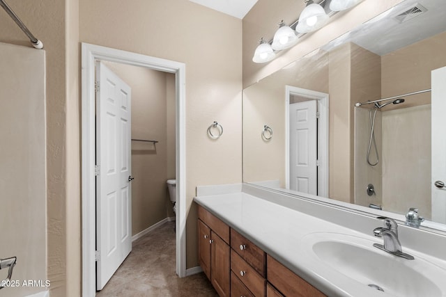 2036 E Carob Dr, Chandler, AZ 85286 - bathroom with a shower, vanity, toilet, and tile patterned floors
