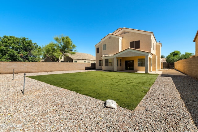 2036 E Carob Dr, Chandler, AZ 85286 - rear view of property with stucco siding and a patio area