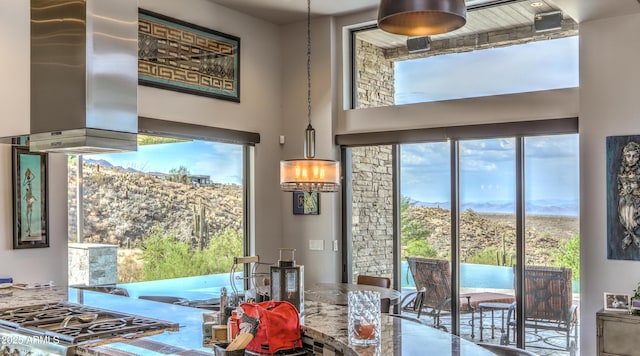 entryway featuring a high ceiling