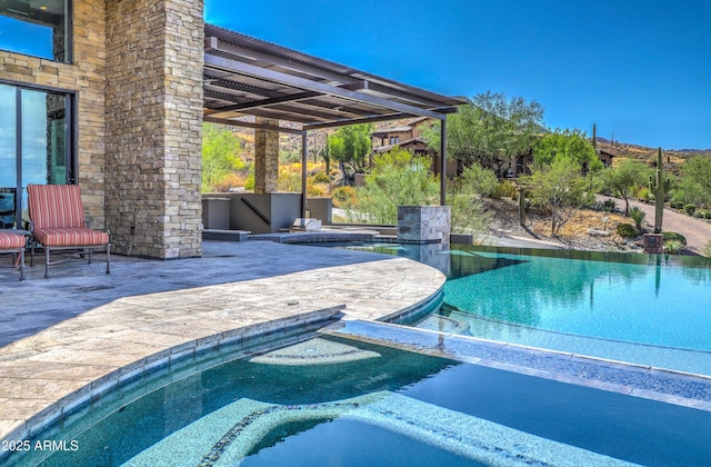 pool featuring a patio