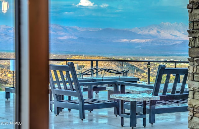 balcony featuring a mountain view