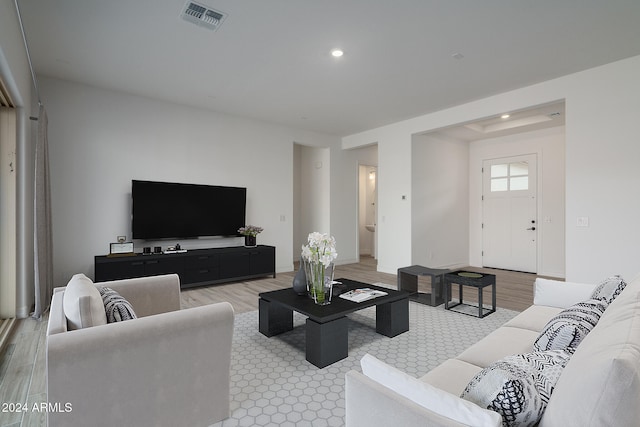 living room with light hardwood / wood-style floors