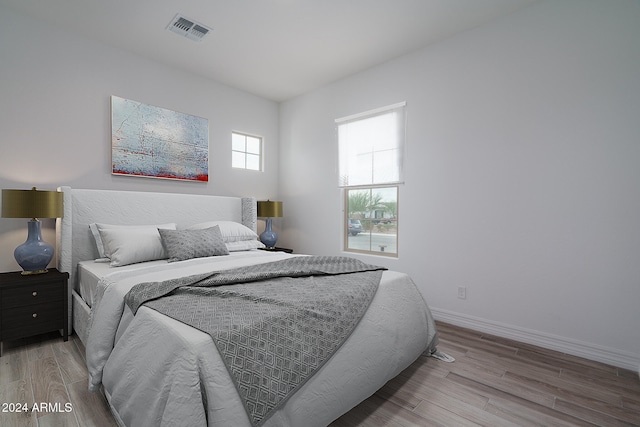 bedroom featuring light hardwood / wood-style flooring