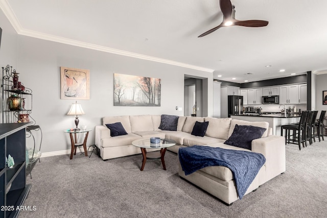 2425 W Bronco Butte Trl Unit 2028, Phoenix, AZ 85085 - living area featuring crown molding, light colored carpet, ceiling fan, recessed lighting, and baseboards