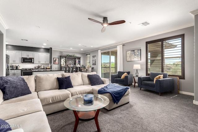 2425 W Bronco Butte Trl Unit 2028, Phoenix, AZ 85085 - living area with ornamental molding, carpet flooring, ceiling fan, baseboards, and recessed lighting