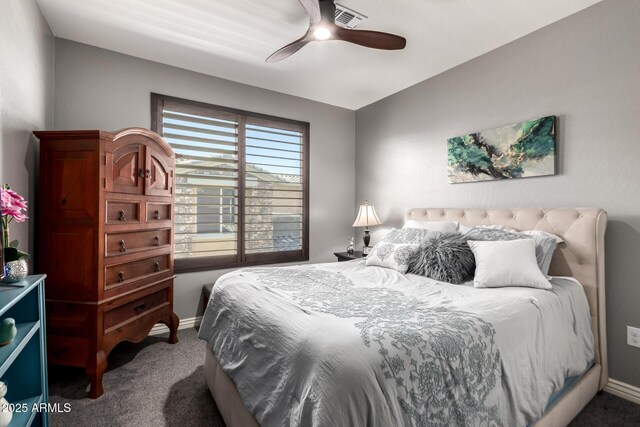2425 W Bronco Butte Trl Unit 2028, Phoenix, AZ 85085 - bedroom featuring carpet, baseboards, and ceiling fan