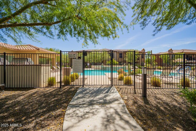 2425 W Bronco Butte Trl Unit 2028, Phoenix, AZ 85085 - gate with a community pool