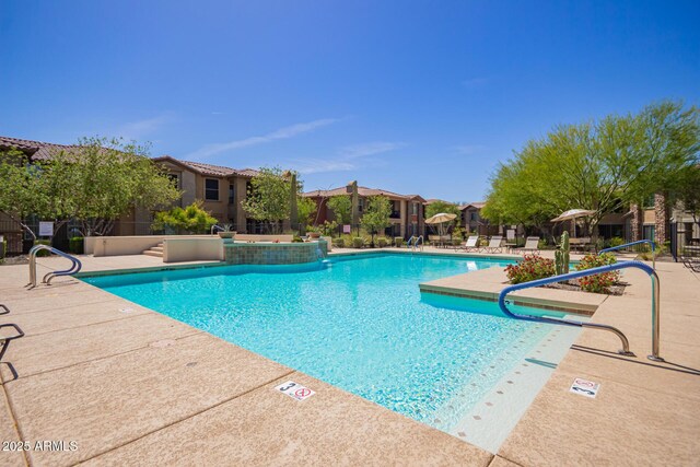 2425 W Bronco Butte Trl Unit 2028, Phoenix, AZ 85085 - community pool with a residential view and a patio