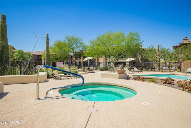 2425 W Bronco Butte Trl Unit 2028, Phoenix, AZ 85085 - community pool featuring a patio and a hot tub