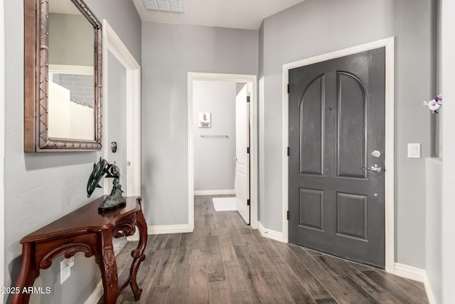 2425 W Bronco Butte Trl Unit 2028, Phoenix, AZ 85085 - entryway with dark wood-style flooring and baseboards